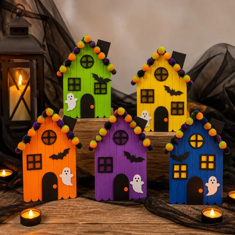 Colorful popsicle-stick haunted house village crafted for Halloween decoration